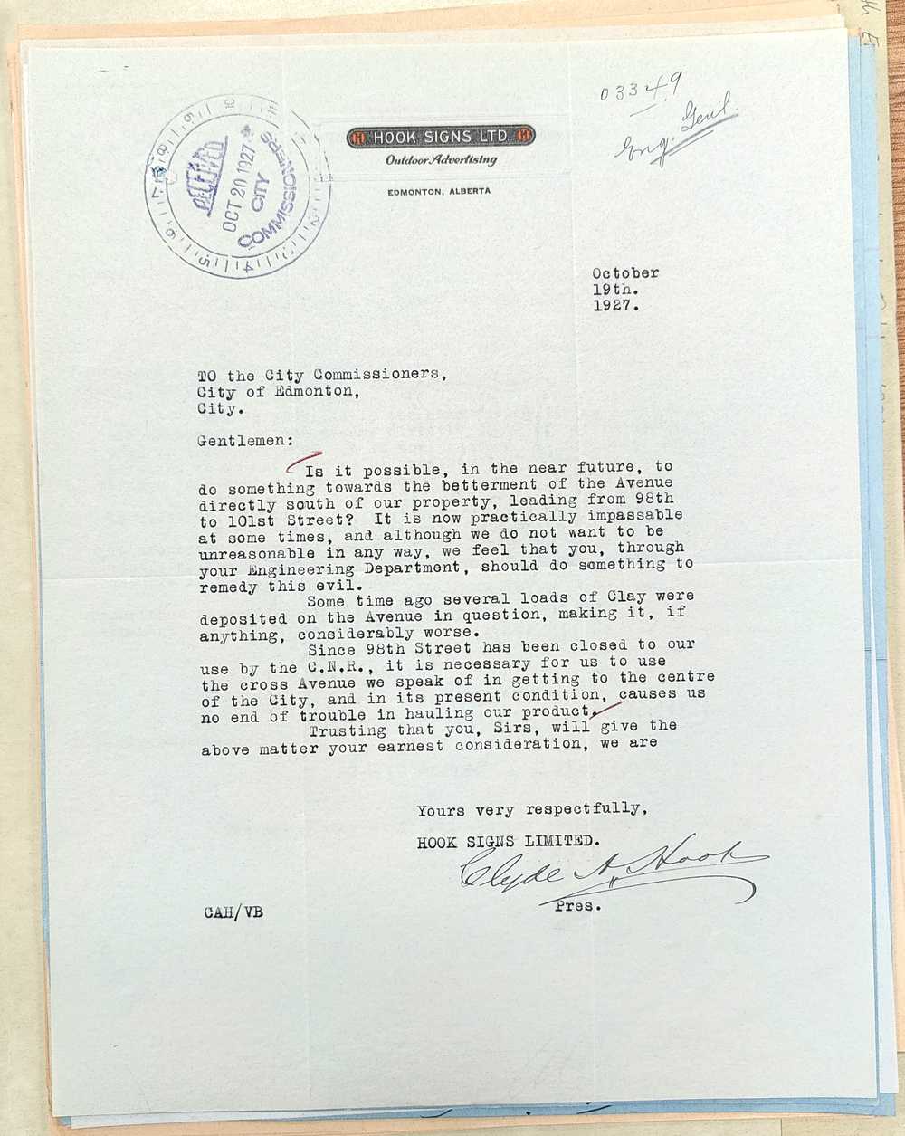 A letter from Clyde A. Hook complaining about the road in front of his sign shop.