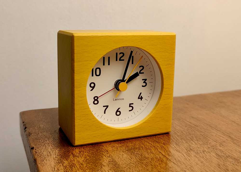 A yellow alarm clock.